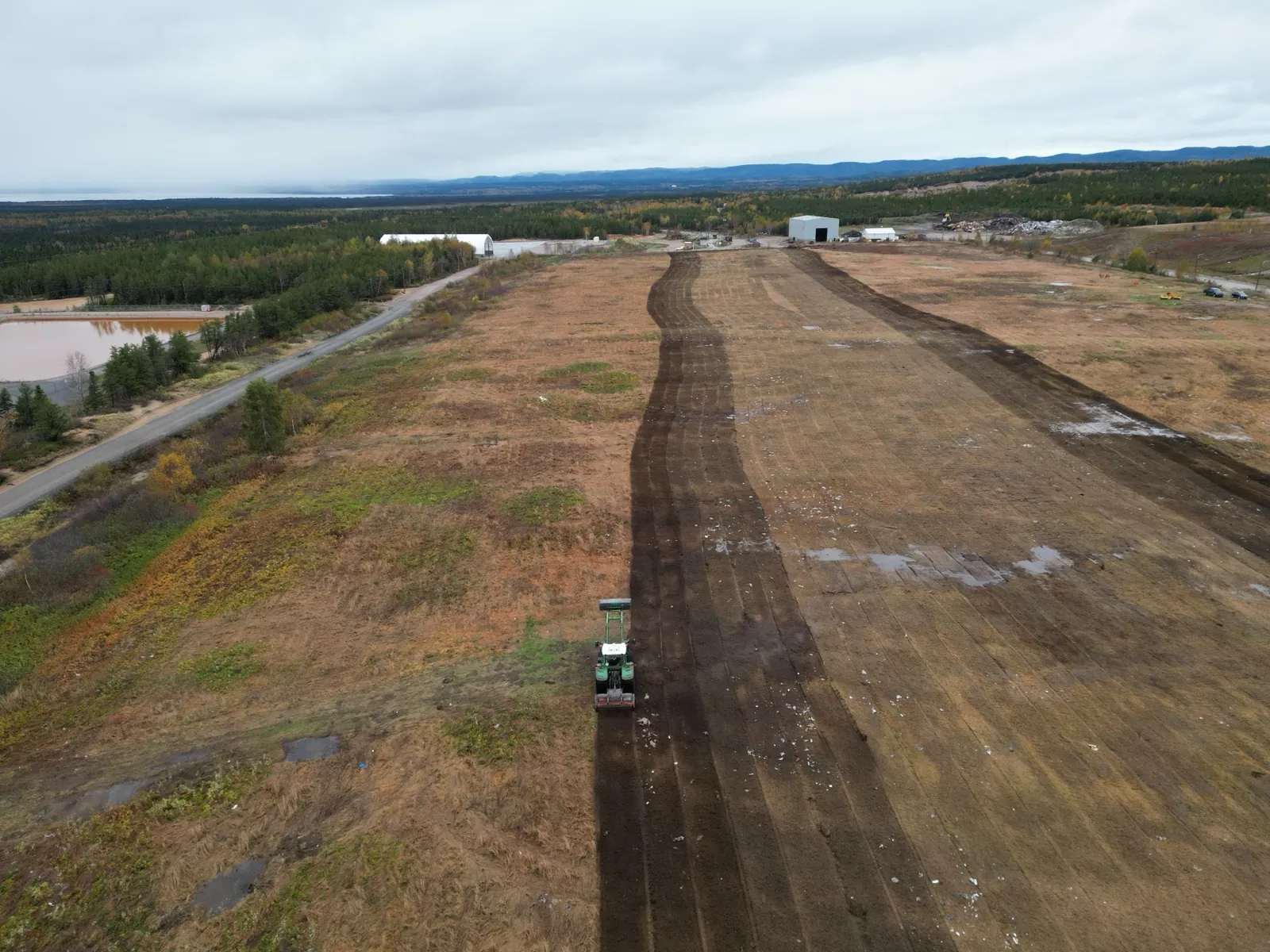 Mature Evacap™ cover on the former Sept-Îles sanitary landfill (drone view, dense willow planting)